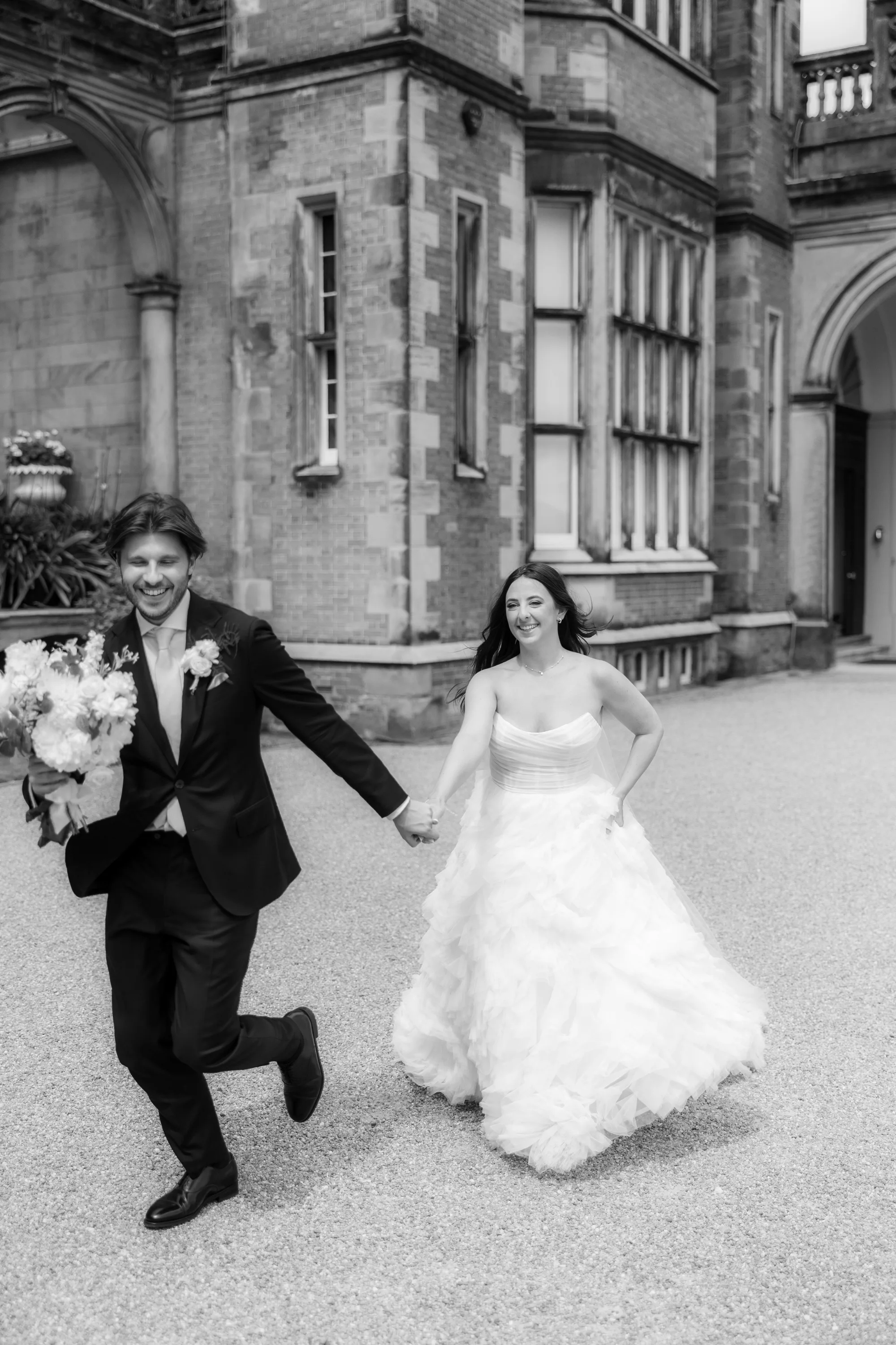 Capesthorne Hall Summer Wedding Jessica Sharpe Wedding Planner Jono Symonds Love My Dress.72 - Sophie & Dimitri's Beautiful, Relaxed & Elegant Wedding Weekend at Capesthorne Hall in Cheshire Bride and groom having run running outside in the grounds of Capesthorne Hall in Cheshire on their wedding day.