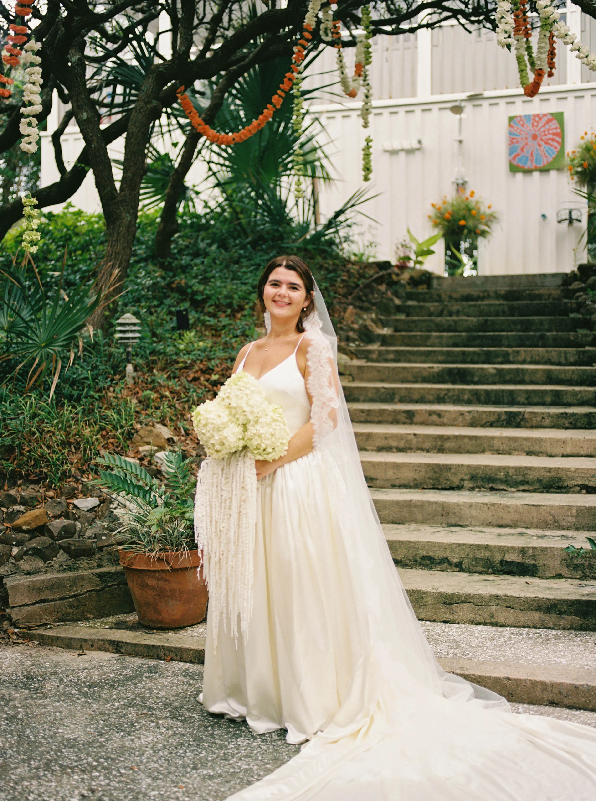 Danielle Frankel Bride Leslie DeAnne Photography.26 1 - Olivia in Danielle Frankel for her Intimate, Modern & Non-Traditional Wedding Bride wearing the Nina gown by Danielle Frankel. She carries a large bouquet of white hydrangea.