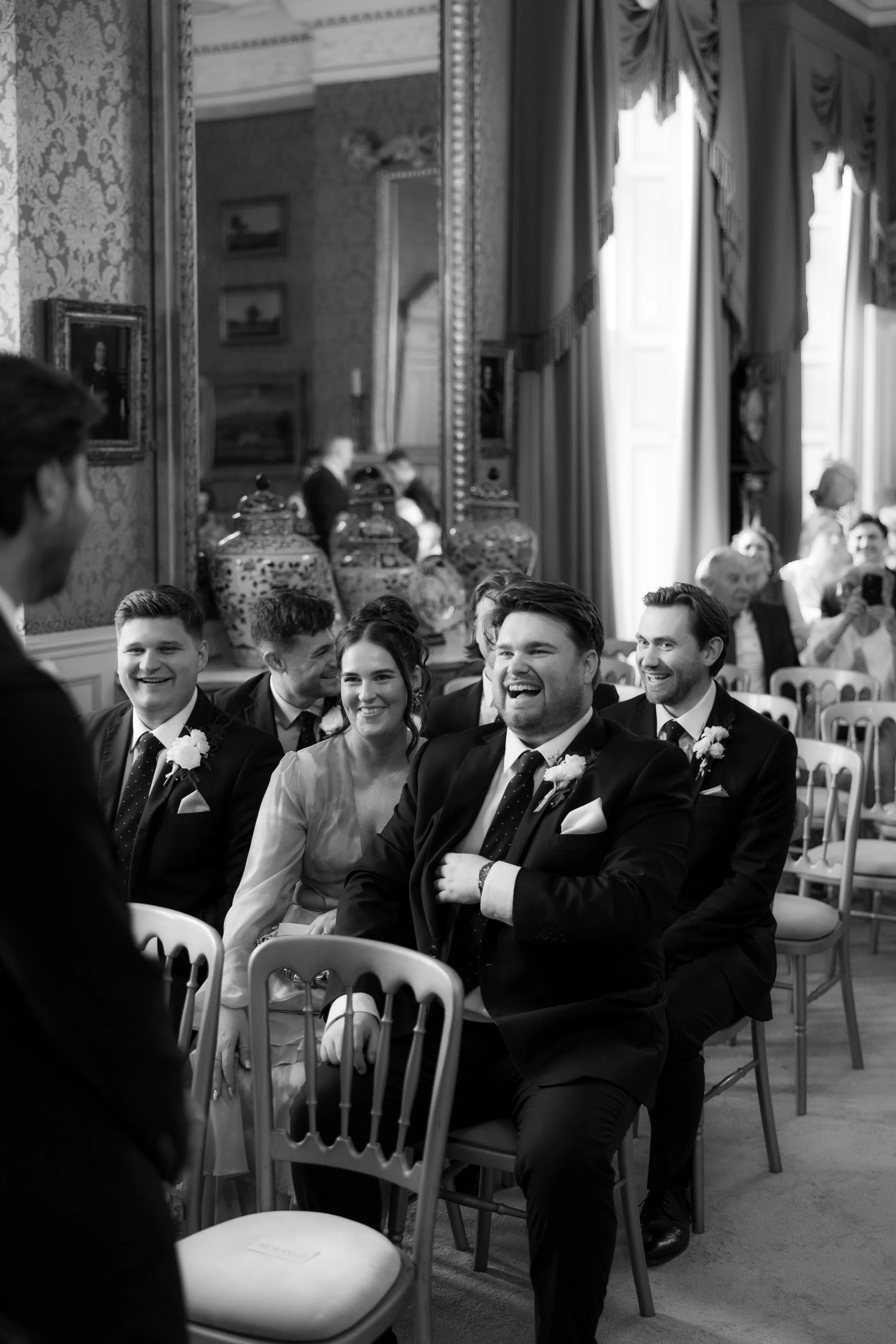Sophie Dimitri Wedding Day Jono Symonds Photo Film 120 - Sophie & Dimitri's Beautiful, Relaxed & Elegant Wedding Weekend at Capesthorne Hall in Cheshire Guests seated ready for a wedding at Capesthorne Hall in Cheshire.