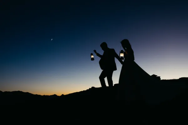 Silhouette of Bride and groom at blue hour after the sun has set