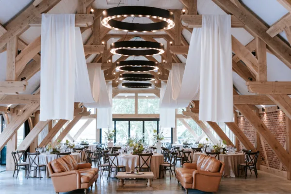 Stunning large wedding barn in Kent with ceiling draping