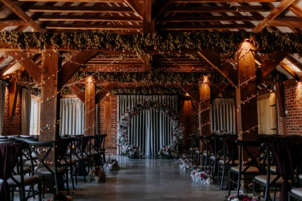 The Harty Estate barn dressed for a wedding ceremony