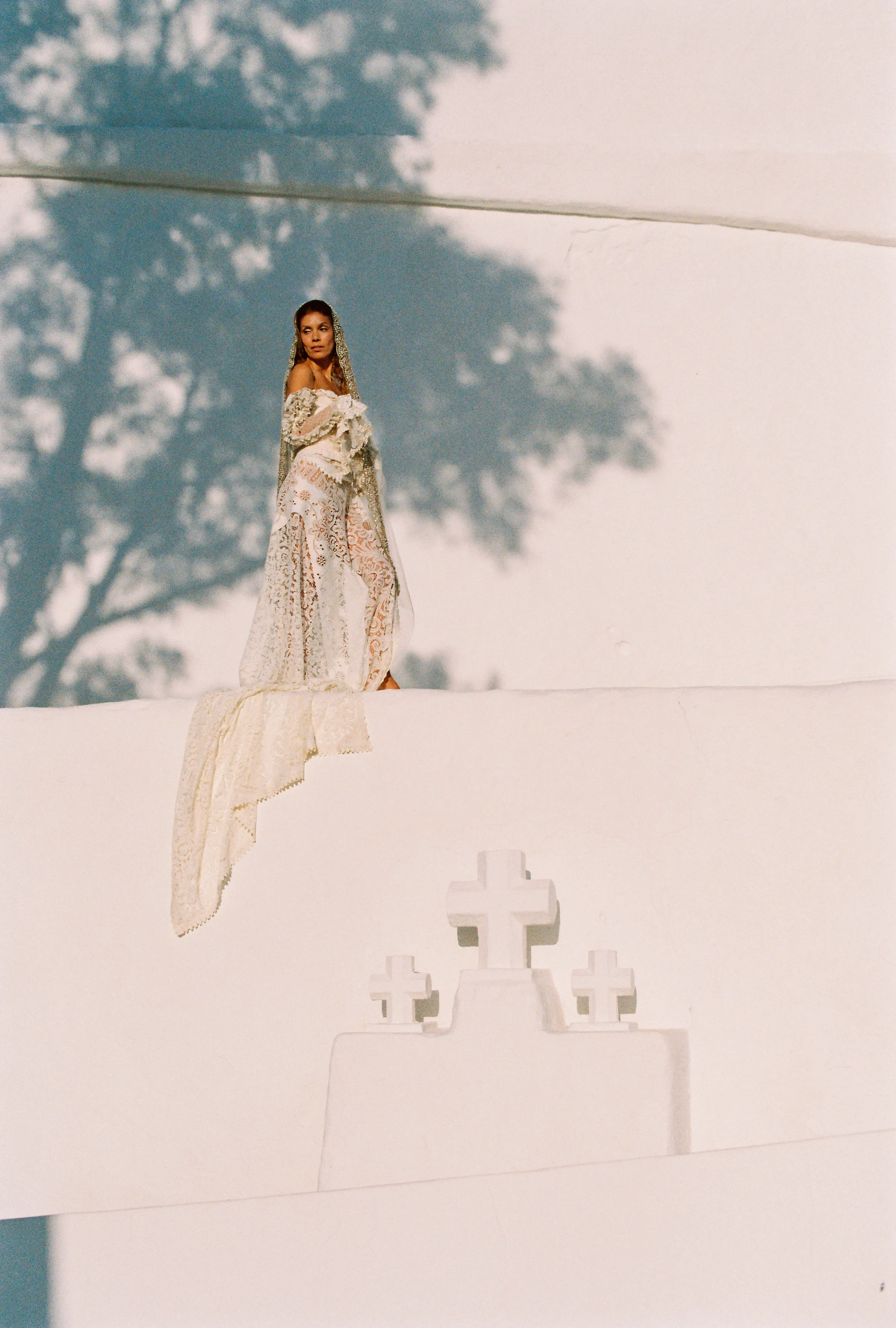 Julita London Ibiza Bridal Editorial Clarissa Sofia Studio 32 - Devotion: Julita London Bridal Fashion at Puig de Missa, Ibiza Model bride at Puig de Missa in Santa Eulària, Ibiza, wearing the Sylvie dress by Julita London and an intricate lace and pearl veil. Photography by Clarissa Sofía Studio.