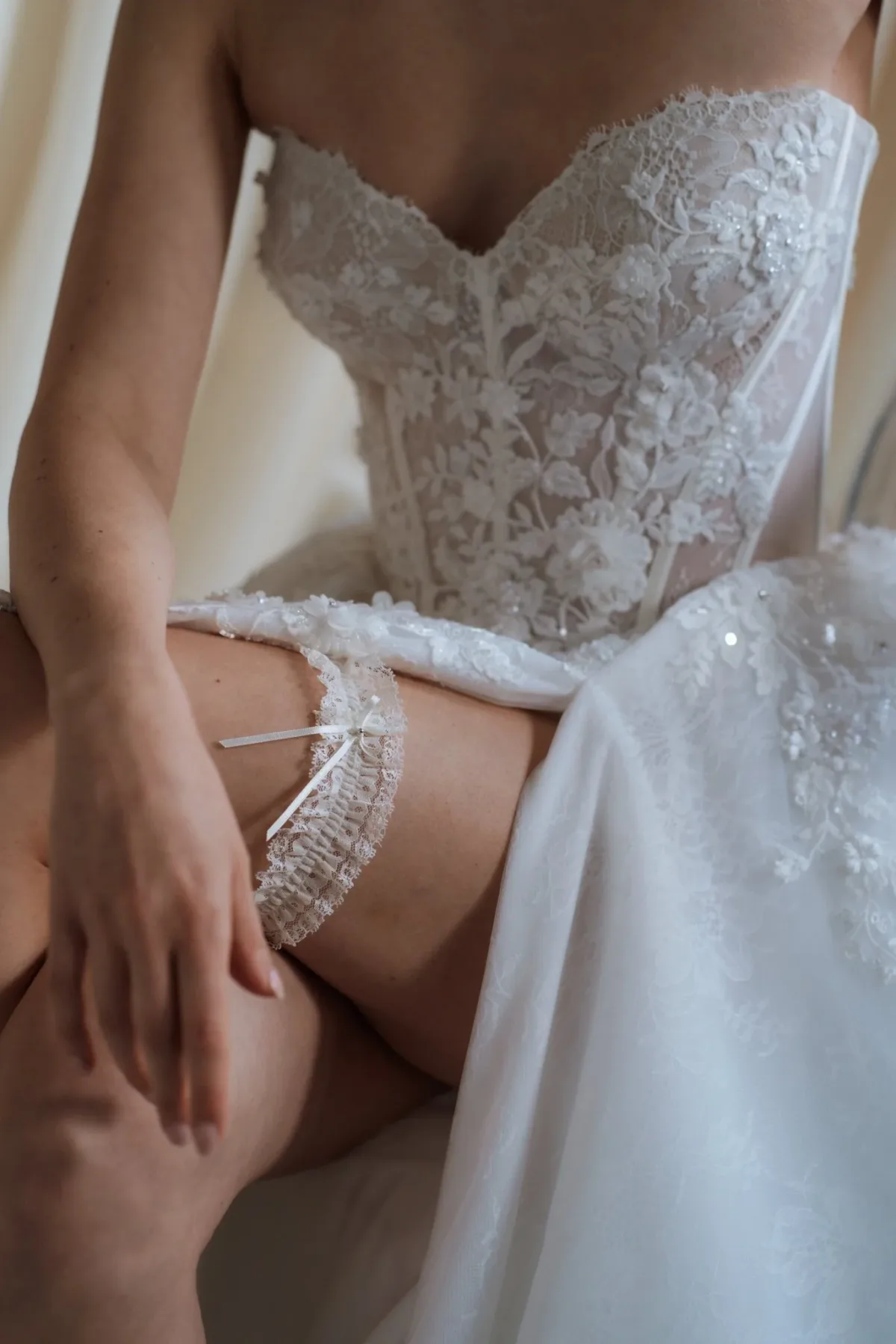 ivory lace garter with bow - A Colourful, Relaxed Family Wedding at Folkerton Mill in Lanark, Scotland Iris, Ivory Lace Bow Bridal Garter