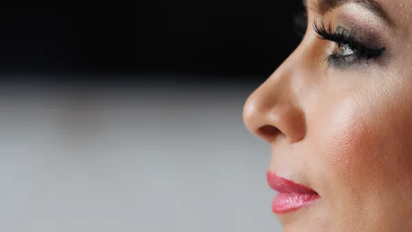 Close-up bridal beauty portrait showing wedding makeup and eye detail.