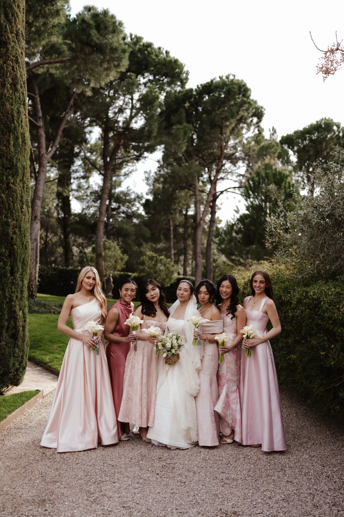 Wedding Toledo Spain Sam Sparks Photography 102 - A Multicultural Wedding in Toledo, Spain, with Korean Heritage and Deep Southern Roots Korean bride wearing Maggie Sottero in the grounds of Cigarral de las Mercedes in Toledo Spain, with her bridesmaids in mismatched pink dresses.