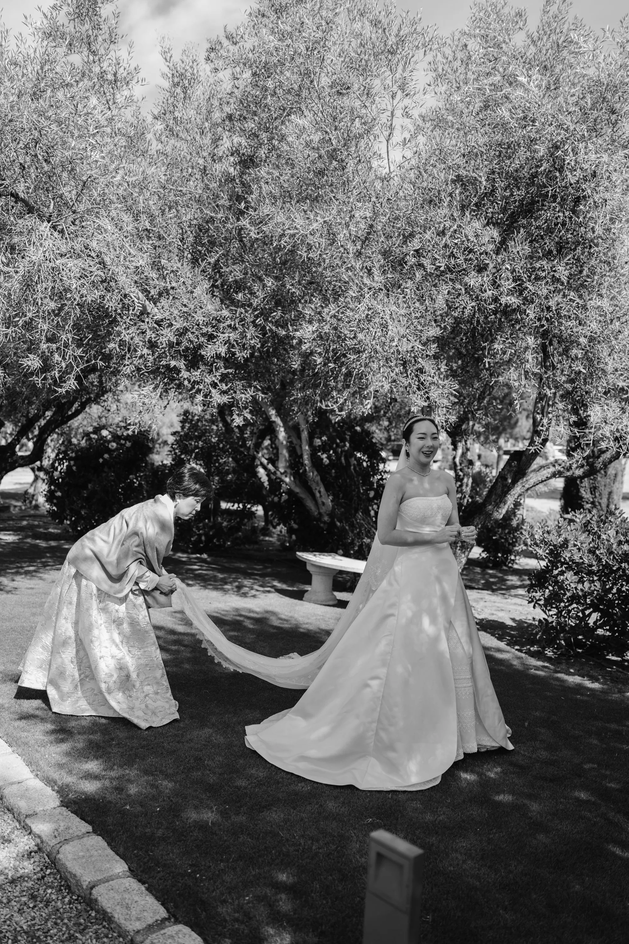 Wedding Toledo Spain Sam Sparks Photography 45 - A Multicultural Wedding in Toledo, Spain, with Korean Heritage and Deep Southern Roots Mother of the Korean bride adjusts her veil.