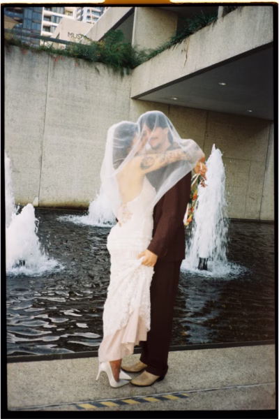 bride groom under veil beside fountains the light photo and film - Home The Light Photo & Film: 35mm Wedding Photography and Super 8 for Creative Couples